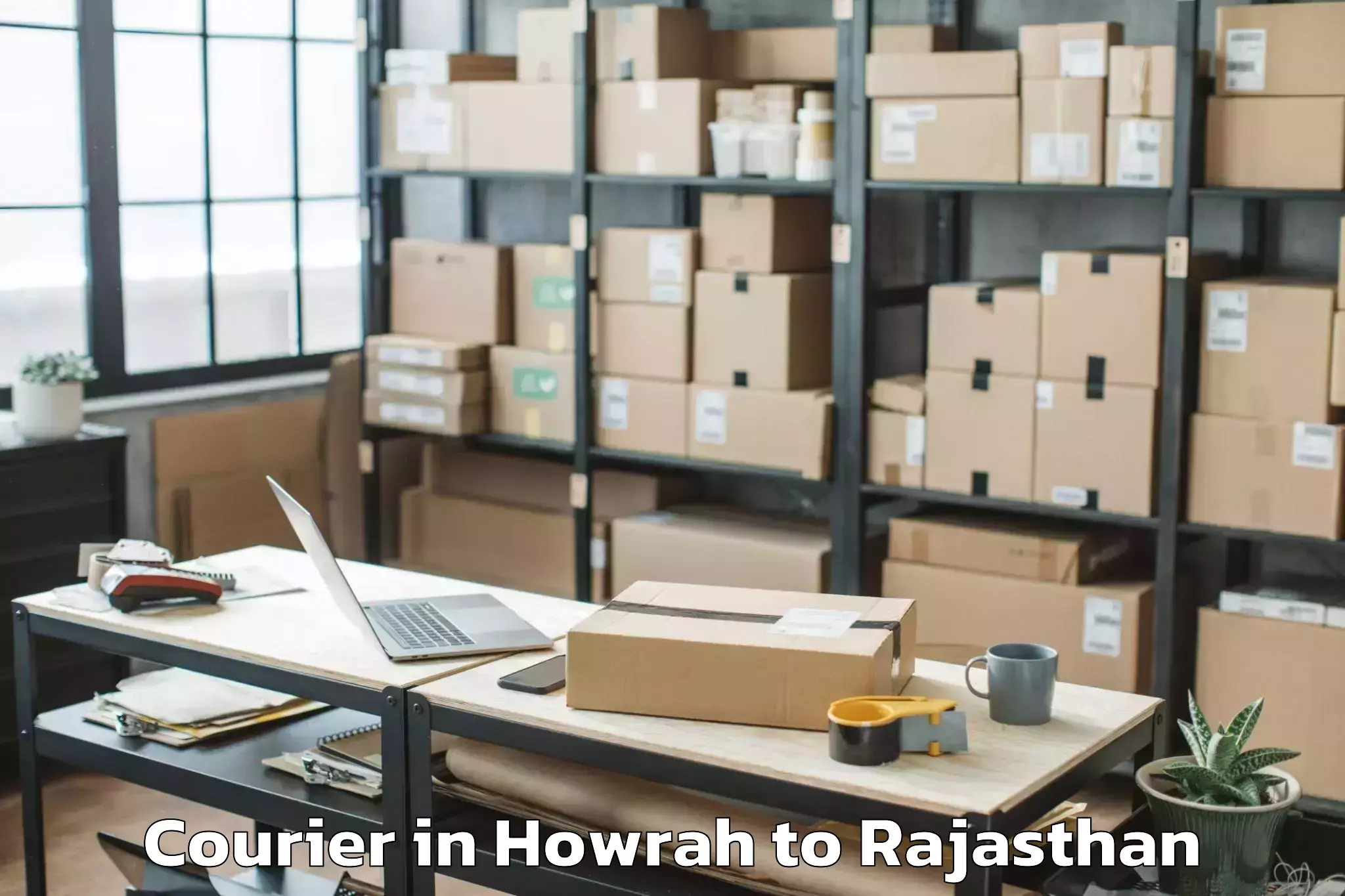 Easy Howrah to Ladnu Courier Booking